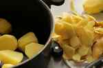 aligot - peel the potatoes